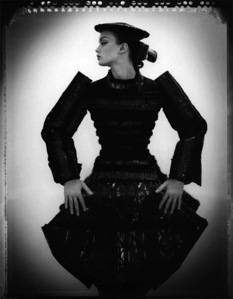 Fine art b/w photography of a fashion model wearing haute couture DIOR by John Galliano, Japanese Collection, hat by Steven Stones.